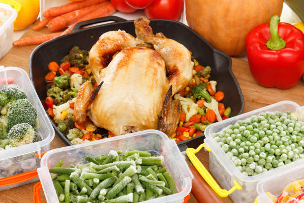 istock Fresh frozen vegetables and fried chicken food 1131009218
