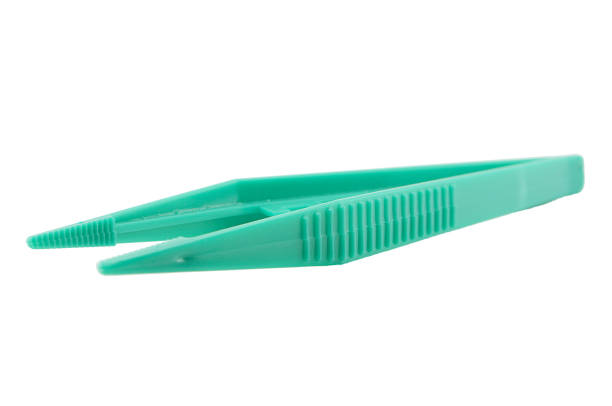 istock green plastic tweezers isolated on white background 1131011719