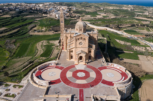 Gharb, Gozo - 26th January 2019. The Ta' Pinu Sanctuary is a neo romanesque church by architect Andrea Vassallo, dedicated in 1932 to the assumption of Our Lady. The parvis has been recently restored and features a number of mosaics commissioned to the Centro Aletti of Rome, under the guidance of Fr Marco Ivan Rupnik, SJ, of Slovenia. The church as well as it's surrounding fields are visible
