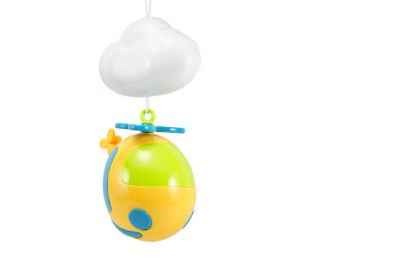 istock children's toy hanging helicopter multicolored with cloud isolated on white background 1131011989