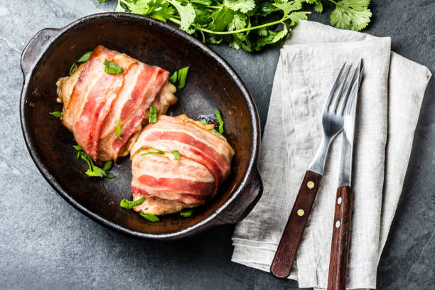 istock Chicken wrapped in bacon. Top view 1131014022