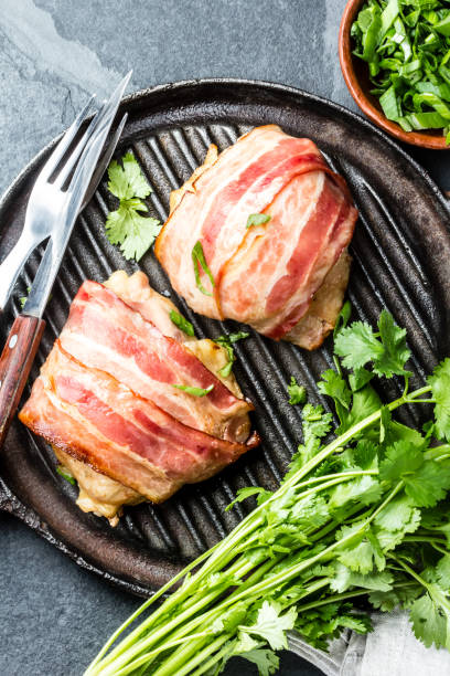 istock Chicken wrapped in bacon. Top view 1131014025