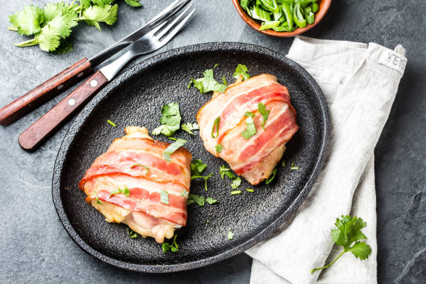 istock Chicken wrapped in bacon. Top view 1131014027
