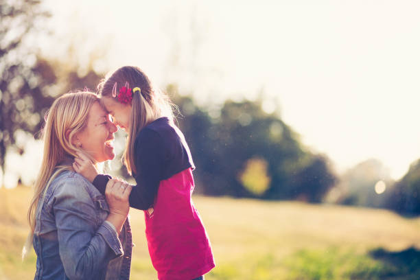 istock Mother and daughter having a great time in nature 1131014838