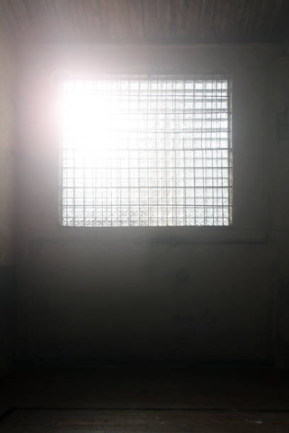 istock Sunshine from Old windows with fences 1131015467