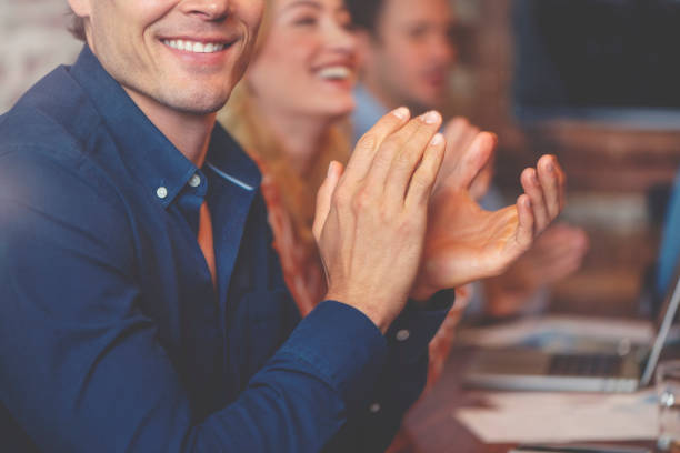 istock Group of business people clapping at a seminar. 1131026433