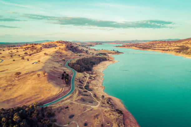 Aerial view of Riverina Highway along Lake Hume and Murray River at sunset. New South Wales, Australia stock photo