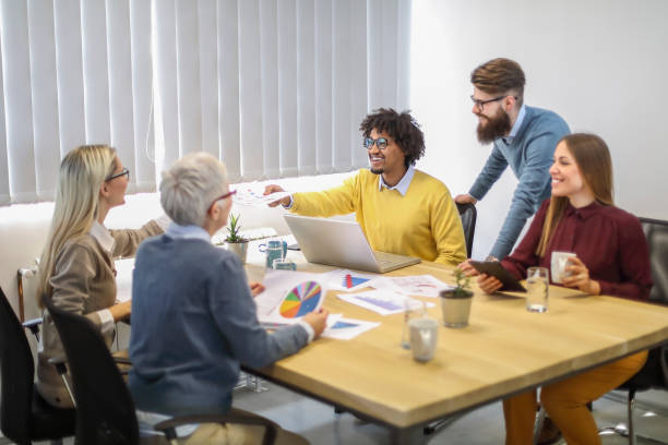 istock Multi-ethnic group of colleagues at meeting 1131028699