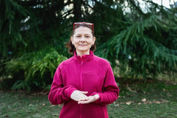 istock Woman using American sign language - hand gesture, phrase 