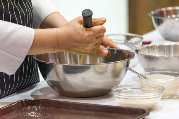 istock chef making dough on kitchen, Mixing Butter Milk Pastry Bakery, cook and cake 1131046395