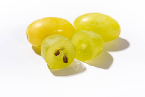 Green grapes and white background