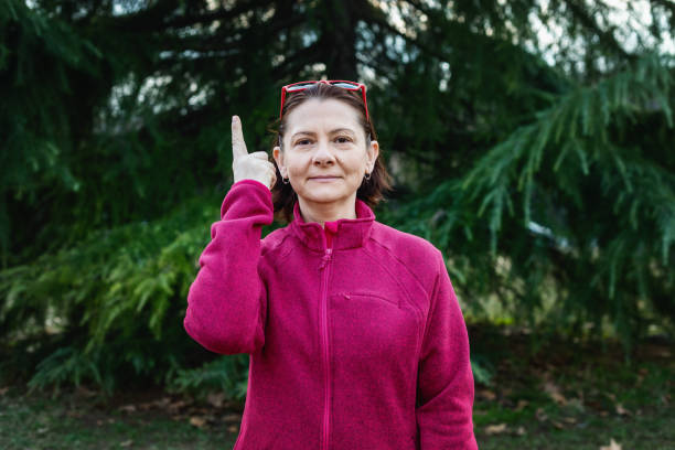 istock Woman using American sign language - hand gesture, term understand 1131048726
