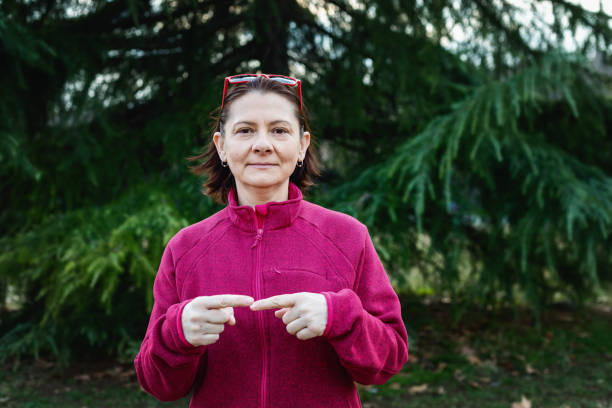 istock Woman using American sign language - hand gesture, term sign 1131048728