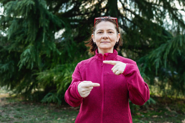 istock Woman using American sign language - hand gesture, term sign 1131048730