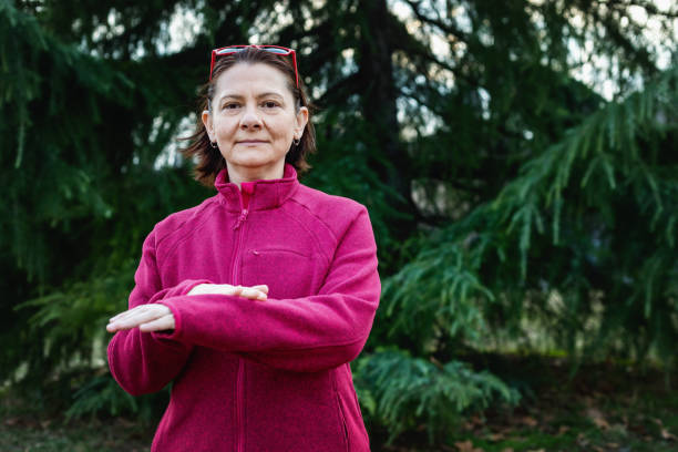 istock Woman using American sign language - hand gesture, term slow 1131048792