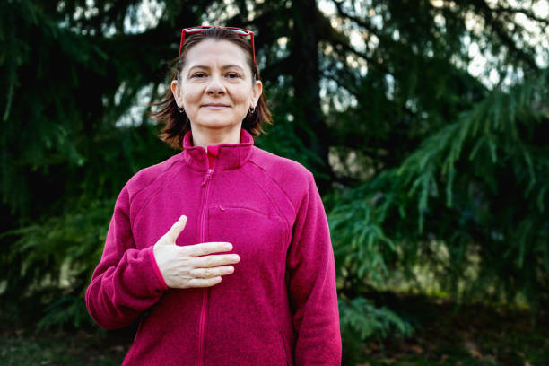 istock Woman using American sign language - hand gesture, term please 1131048800