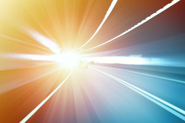 Abstract Bright Light of Speeding Through Tunnel Abstract bright light of speed through a tunnel. light at the end of the tunnel stock pictures, royalty-free photos & images