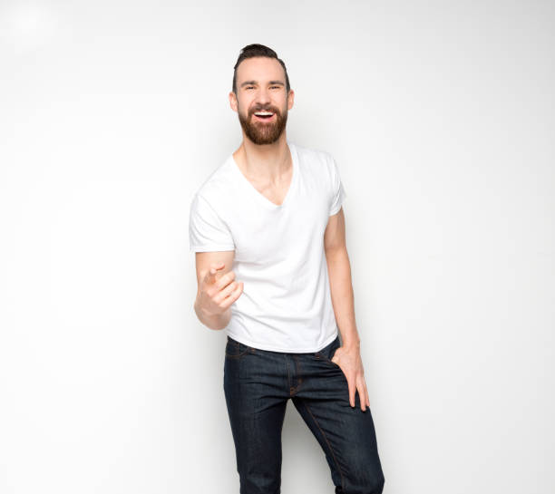 istock Handsome man standing with white shirt on white background 1131055569