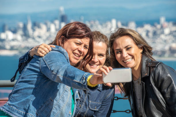 istock Friends posing together for a selfie 1131057431