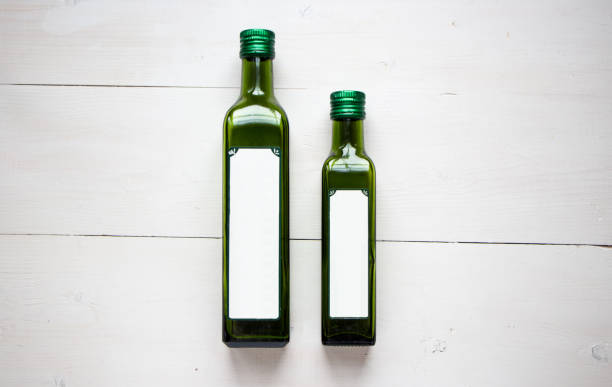 istock Green bottle for olive oil with white blank sticker for your text or design 1131066593