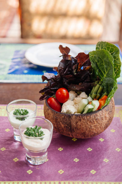 istock fresh vegetables dip, cauliflower, tomatoes, cabbage, cucumber with ranch sauce 1131067081