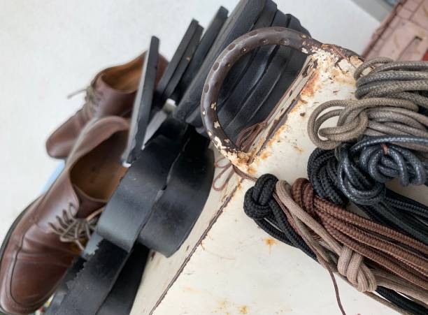 Leather shoes in cobbler workshop on the street