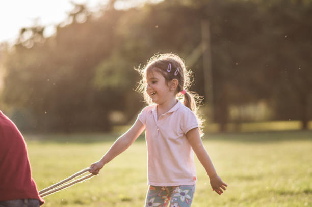 istock Children games with a rope 1131075800