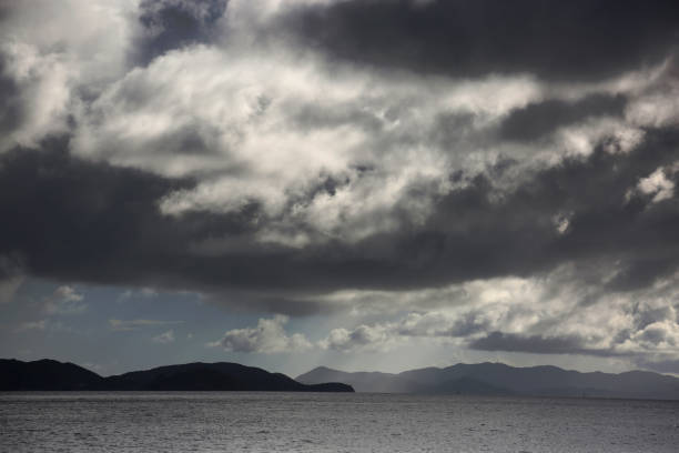 Storm clouds build over islands in the British Virgin Islands in July 2017.