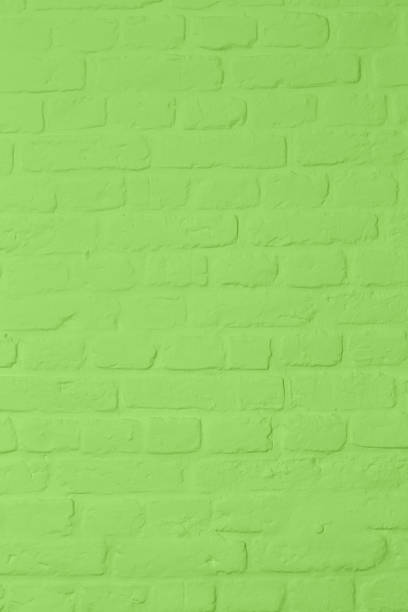 istock Pastell bright green colored brickstone wall 1131076666