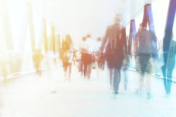 istock Motion Blur of Commuters Walking on Pedestrian Walkway 1131080586