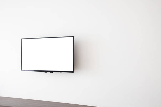 istock blank screen television on concrete wall at living room. 1131082362