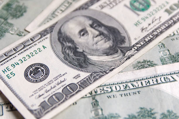 istock Background with money american hundred dollar bills - horizontal 1131083387