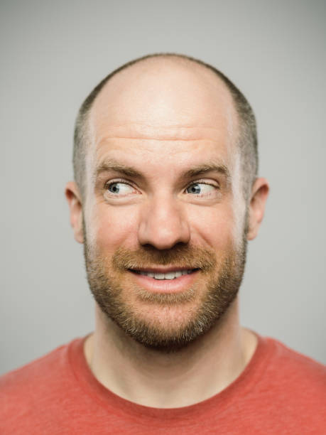 istock Real caucasian man with happy expression looking to the side 1131084787
