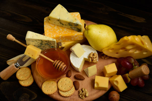 istock Different types of cheeses on a blackboard 1131085580
