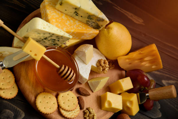 istock Various types of cheese on a rustic wooden table 1131085612