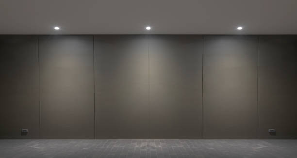 istock Lights wall and floor from lamp on the black wall background 1131092704