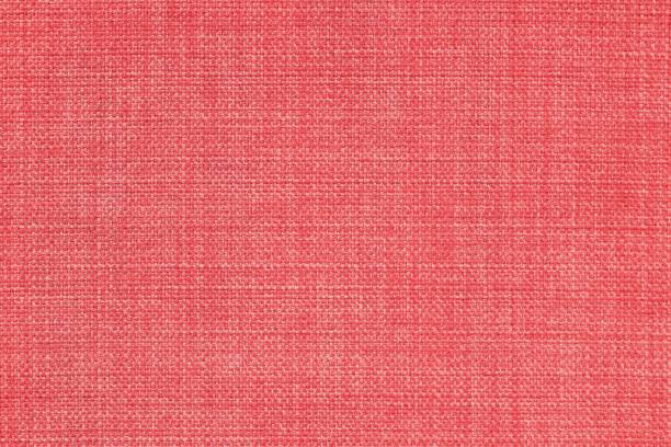 istock Fabric texture background in coral color 1131092731