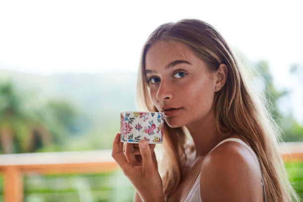 istock Blond girl with tea 1131093192