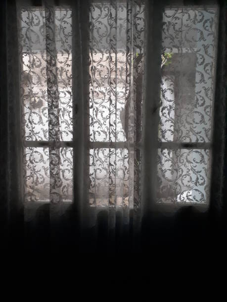 istock Luminous Window and Dark Room 1131095075