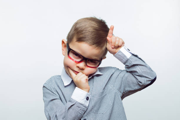 istock Child with a grimace on his face 1131095757