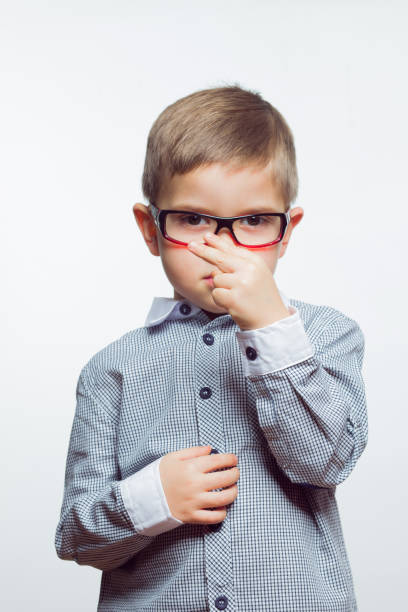 istock Child with a grimace on his face 1131095797