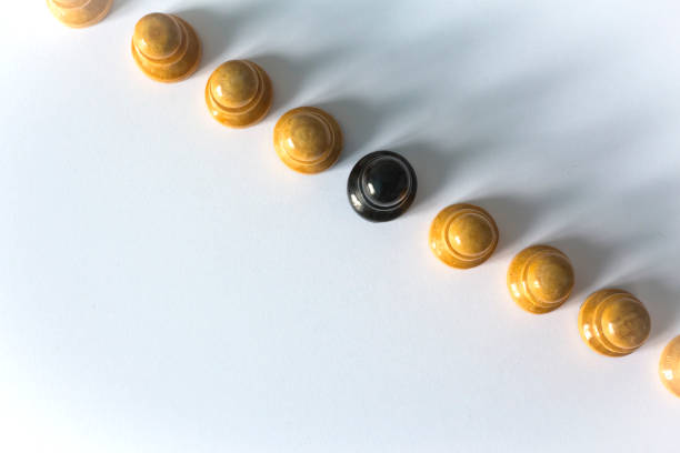 istock chess pawns lined up in a row top view 1131096300