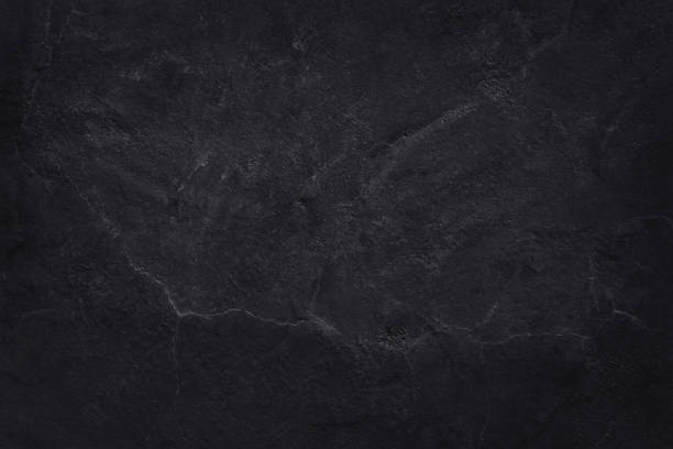 istock Dark grey black slate texture with high resolution, background of natural black stone wall. 1131097182