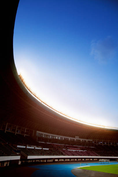 istock Floodlights at an empty stadium in China 1131097359