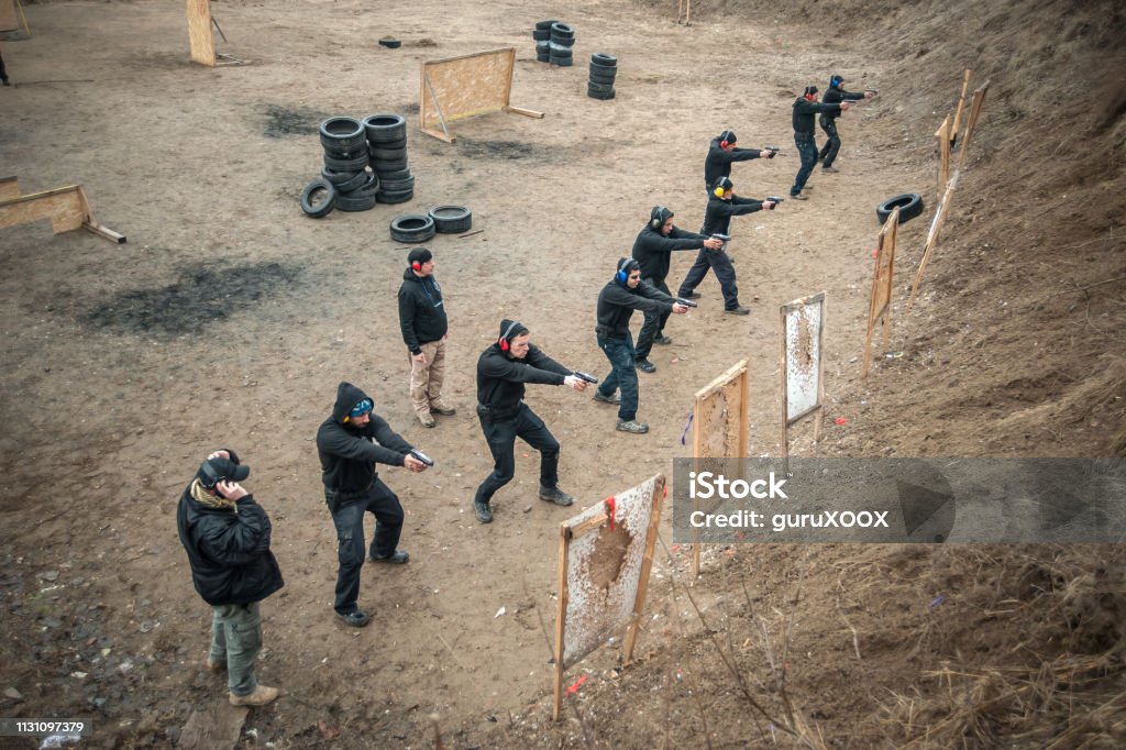 Gun Range Instructor Students Group With Instructors Practice Gun Shooting On Shooting Range ...