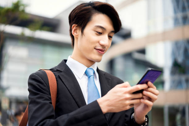 istock Asian businessman using his smartphone 1131098975
