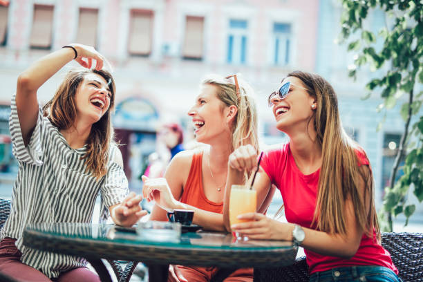 istock Three beautiful friends in a cafe having fun 1131100146