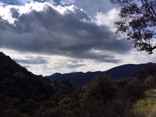 istock Storm clouds gather over the mountains 1131100255