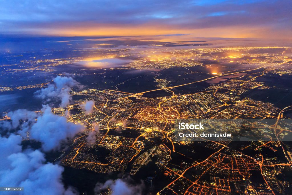 Leiden from the sky at night night Beautiful aerial cityscape view of the city of Leiden, the Netherlands, after sunset at night in the blue hour City Stock Photo