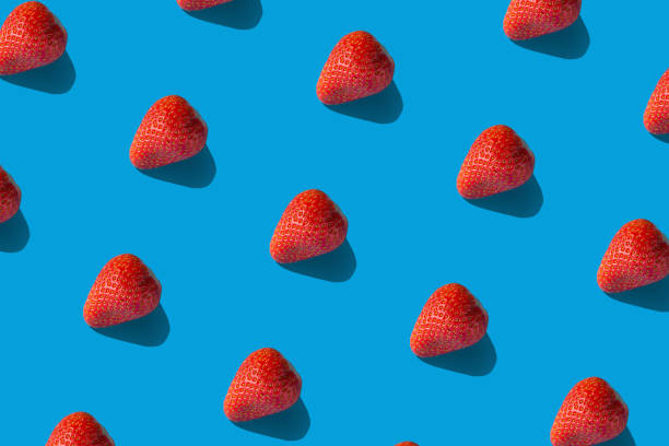 istock Colorful pattern of strawberries on blue background. high resolution 1131103889